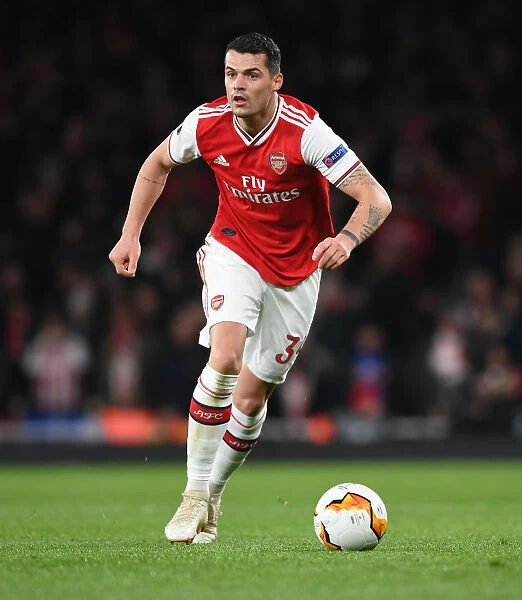 Arsenal's Granit Xhaka in Europa League Action against Olympiacos at Emirates Stadium