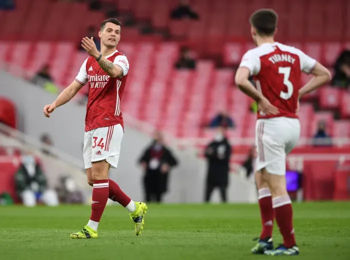 Framed Print : Arsenal's Granit Xhaka Faces Off Against Tottenham in Premier League Rivalry, London 2021