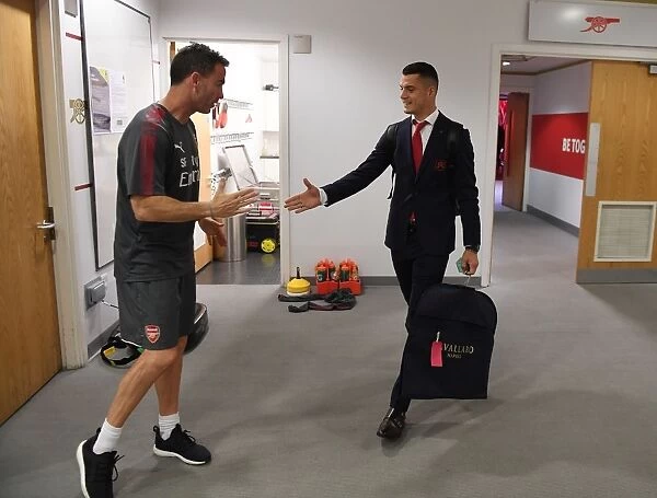 Arsenal's Granit Xhaka and Fitness Coach Shad Forsythe in the Home Changing Room before Arsenal v Brighton & Hove Albion (2017-18)