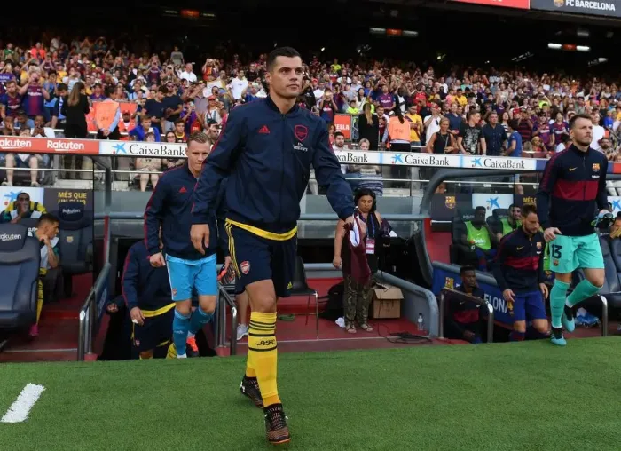 Framed Print : Arsenal's Granit Xhaka Leads Team Out in FC Barcelona Pre-Season Friendly (2019-20)