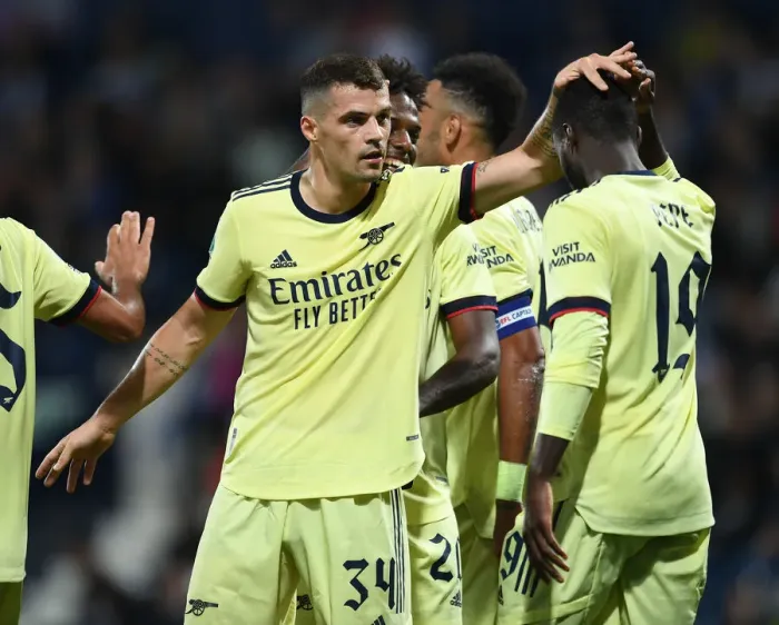 Framed Print : Arsenal's Granit Xhaka and Nicolas Pepe Celebrate Goals in Carabao Cup Win Against West Bromwich Albion