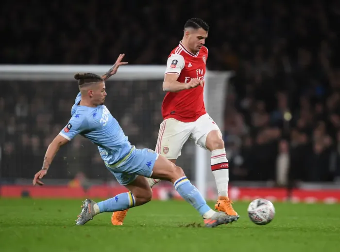 Framed Print : Arsenal's Granit Xhaka Outmaneuvers Leeds Kalvin Phillips in FA Cup Clash Framed Print : Arsenal's Granit Xhaka Outmaneuvers Leeds Kalvin Phillips in FA Cup Clash
