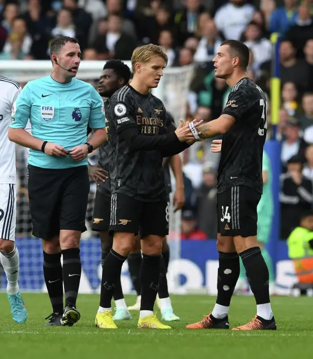 Framed Print : Arsenal's Granit Xhaka Receives Captain's Armband from Martin Odegaard against Leeds United (2022-23)