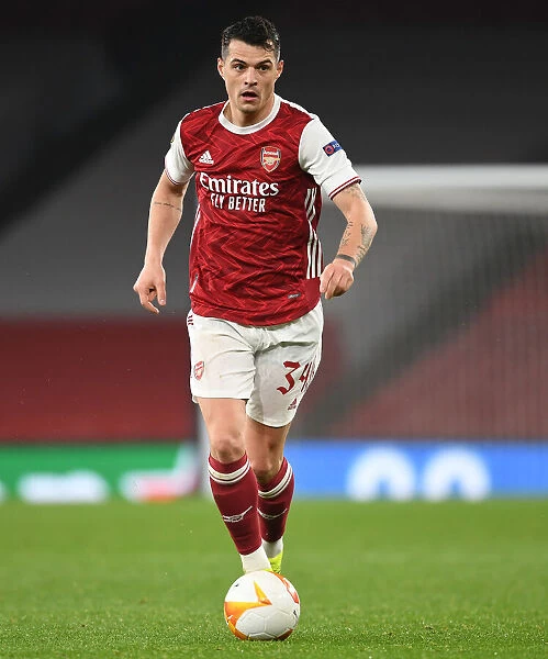 Arsenal's Granit Xhaka in UEFA Europa League Action Against Olympiacos (Behind Closed Doors)