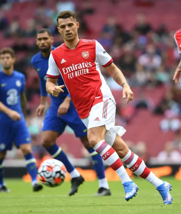 Framed Print : Arsenal's Granit Xhaka: Unyielding Performance Against Chelsea in Pre-Season Clash