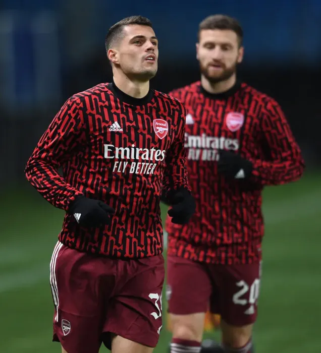 Framed Print : Arsenal's Granit Xhaka Warms Up Ahead of Molde FK Clash in Europa League