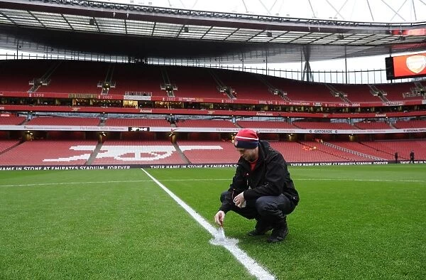 Arsenal's Groundsman Alan Russell Readies Emirates Stadium Pitch for FA Cup Clash Against Tottenham
