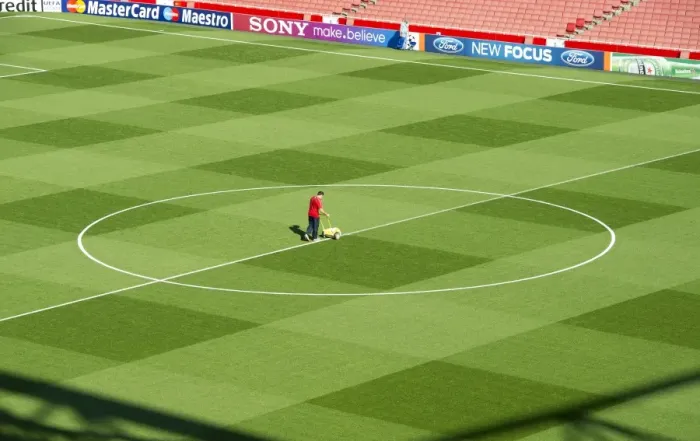 Framed Print : Arsenal's Groundsman Paul Ashcroft Readies Emirates Pitch for Champions League Victory over Olympiacos Framed Print : Arsenal's Groundsman Paul Ashcroft Readies Emirates Pitch for Champions League Victory over Olympiacos
