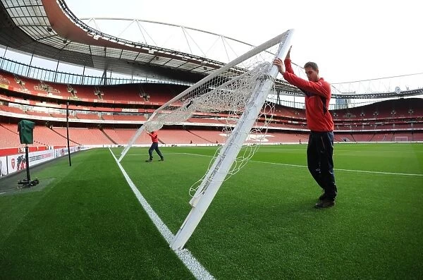 Arsenal's Groundsman Prepares the Emirates Pitch for Arsenal vs Bournemouth (2015-16)