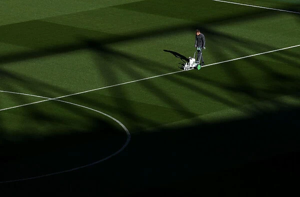 Arsenal's Groundsman Readies the Pitch for Arsenal v Leicester City (2018-19)