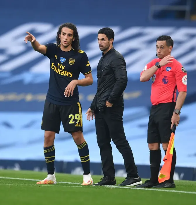 Framed Print : Arsenal's Guendouzi and Arteta in Deep Conversation during Manchester City Clash (2019-20) Framed Print : Arsenal's Guendouzi and Arteta in Deep Conversation during Manchester City Clash (2019-20)