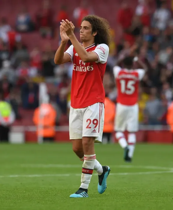 Framed Print : Arsenal's Guendouzi Celebrates with Fans after Arsenal vs. Tottenham Match, 2019-20 Premier League Framed Print : Arsenal's Guendouzi Celebrates with Fans after Arsenal vs. Tottenham Match, 2019-20 Premier League