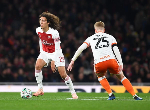 Arsenal's Guendouzi Clashes with Blackpool's Guy in Carabao Cup Showdown