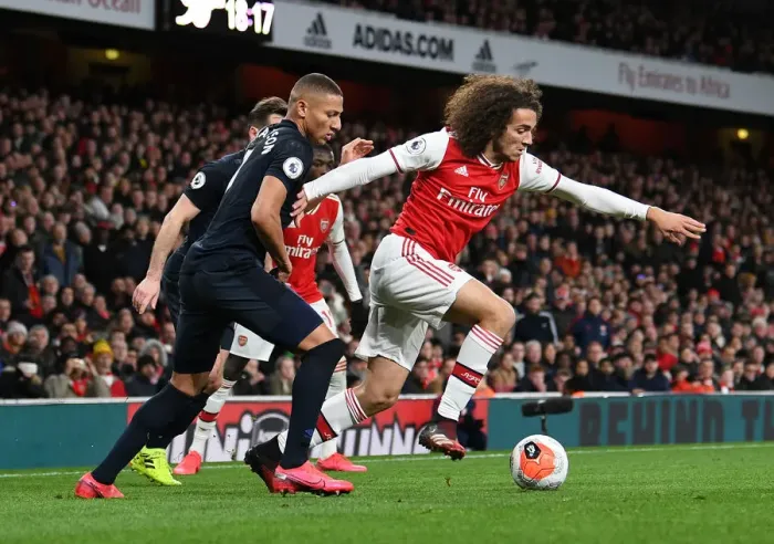 Framed Print : Arsenal's Guendouzi Clashes with Everton's Richarlison in Premier League Showdown