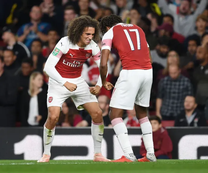 Framed Print : Arsenal's Guendouzi and Iwobi: Celebrating Their Second Goal in Carabao Cup Match