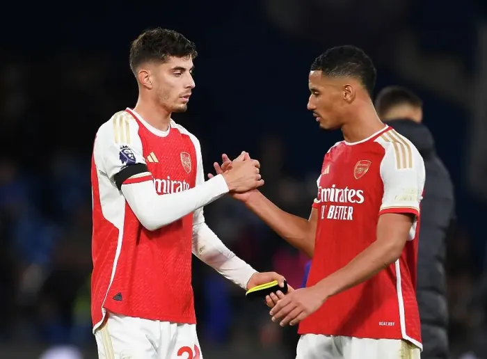 Framed Print : Arsenal's Havertz and Saliba Share a Moment After Chelsea Showdown (2023-24 Premier League)