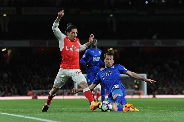 Arsenal's Hector Bellerin Clashes with Leicester's Christian Fuchs in Premier League Showdown