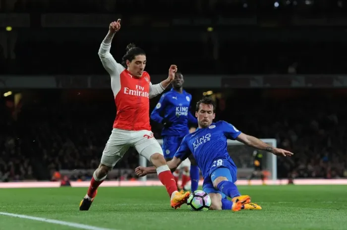 Framed Print : Arsenal's Hector Bellerin Clashes with Leicester's Christian Fuchs in Premier League Showdown