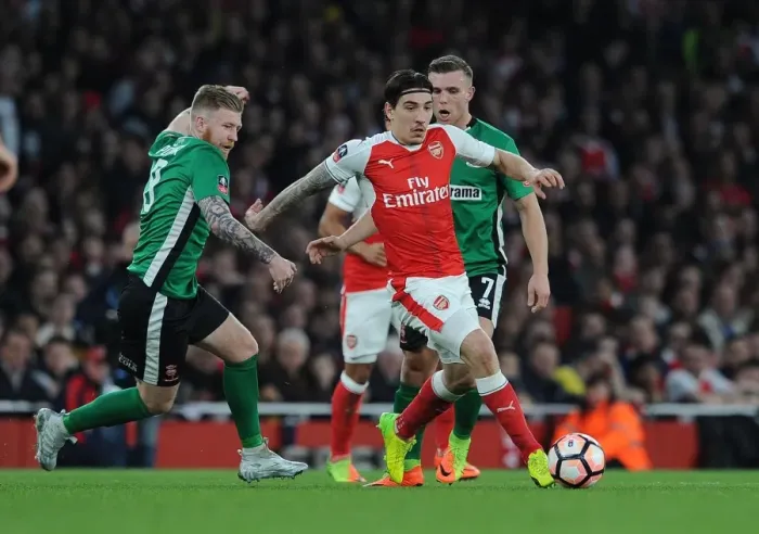 Framed Print : Arsenal's Hector Bellerin Faces Off Against Lincoln City's Alan Power in FA Cup Quarter-Final Showdown Framed Print : Arsenal's Hector Bellerin Faces Off Against Lincoln City's Alan Power in FA Cup Quarter-Final Showdown