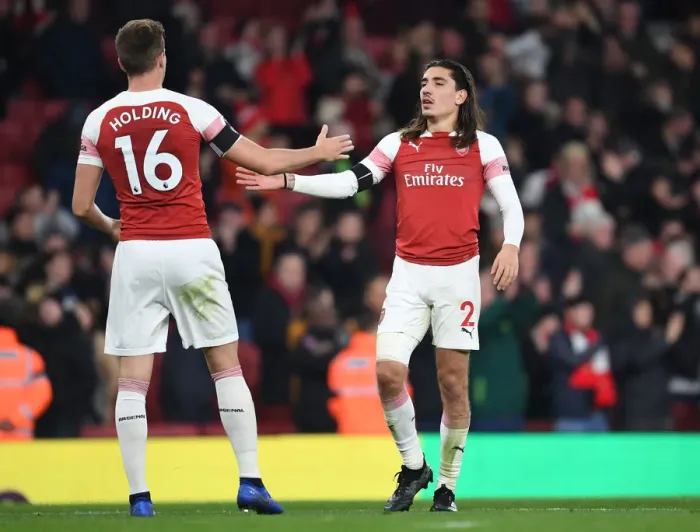 Framed Print : Arsenal's Holding and Bellerin: United in Defiance Against Liverpool