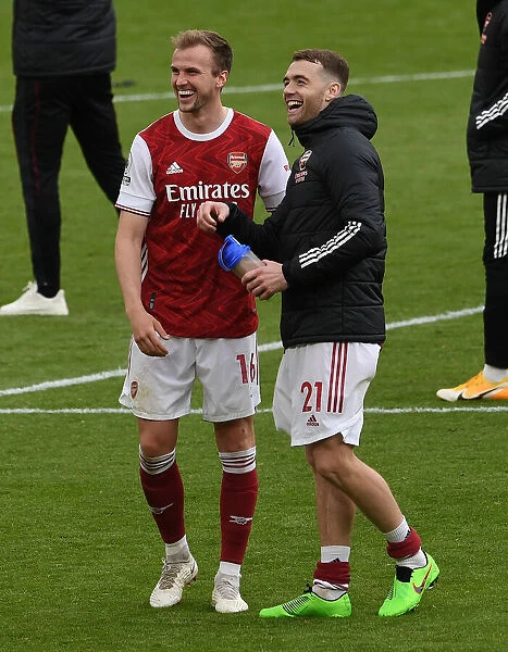 Arsenal's Holding and Chambers Celebrate Victory Over Brighton & Hove Albion (2020-21)