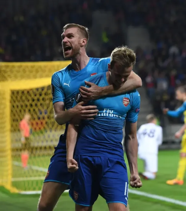 Framed Print : Arsenal's Holding and Mertesacker Celebrate Goal in Europa League Against FC BATE Borisov Framed Print : Arsenal's Holding and Mertesacker Celebrate Goal in Europa League Against FC BATE Borisov
