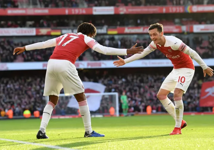 Framed Print : Arsenal's Iwobi and Ozil: United in Triumph - Celebrating a Goal Against Burnley, 2018-19 Premier League