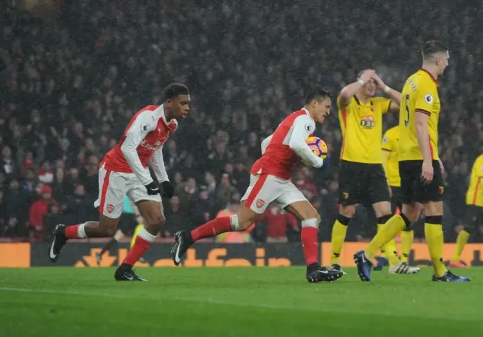 Framed Print : Arsenal's Iwobi and Sanchez Celebrate Goal Against Watford (2016-17) Framed Print : Arsenal's Iwobi and Sanchez Celebrate Goal Against Watford (2016-17)
