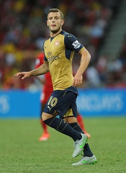 Arsenal's Jack Wilshere in Action against Singapore XI at Singapore National Stadium (July 2015)