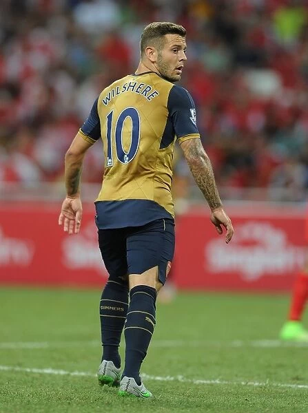 Arsenal's Jack Wilshere in Action against Singapore XI at the Barclays Asia Trophy