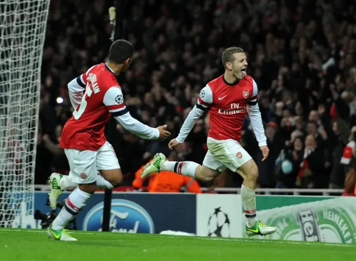 Framed Print : Arsenal's Jack Wilshere and Alex Oxlade-Chamberlain Celebrate First Goal Against Montpellier (2012-13)