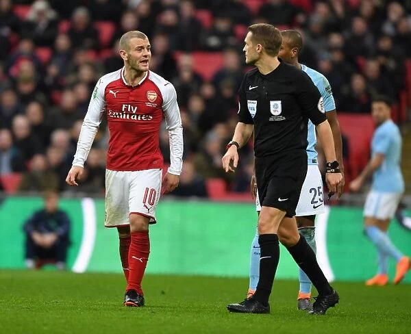 Arsenal's Jack Wilshere Argues with Referee Craig Pawson during the Carabao Cup Final against Manchester City