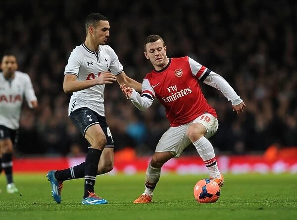 Arsenal's Jack Wilshere Battles Past Tottenham's Nabil Bentaleb in FA Cup Clash