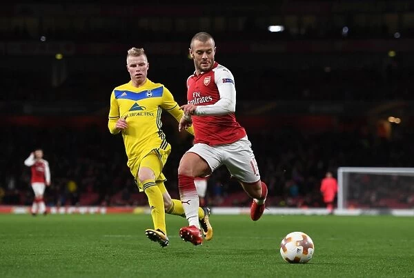 Arsenal's Jack Wilshere Clashes with BATE Borisov's Evgeni Berezkin in Europa League Showdown