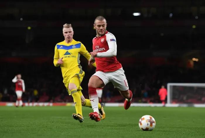 Framed Print : Arsenal's Jack Wilshere Clashes with BATE Borisov's Evgeni Berezkin in Europa League Showdown Framed Print : Arsenal's Jack Wilshere Clashes with BATE Borisov's Evgeni Berezkin in Europa League Showdown