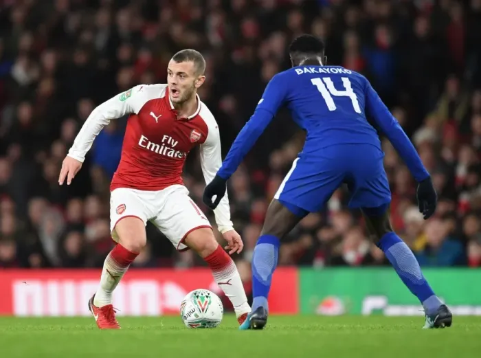 Framed Print : Arsenal's Jack Wilshere Clashes with Chelsea's Tiemoue Bakayoko in Carabao Cup Semi-Final