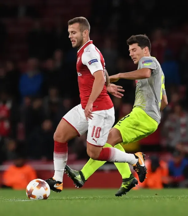 Framed Print : Arsenal's Jack Wilshere Clashes with FC Köln's Milos Jojic in Europa League Showdown