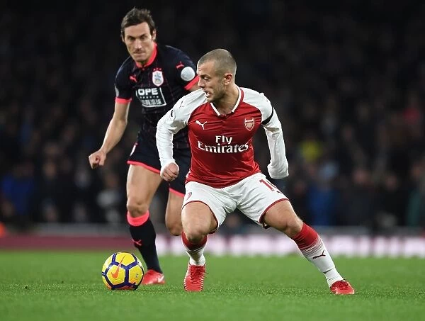Arsenal's Jack Wilshere Clashes with Huddersfield's Dean Whitehead in Premier League Showdown