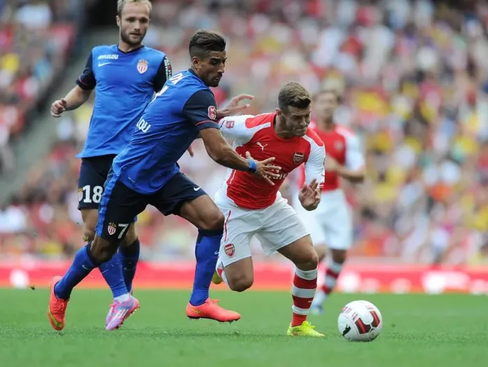 Framed Print : Arsenal's Jack Wilshere Clashes with AS Monaco's Nabil Dirar in 2014-15 Emirates Cup Framed Print : Arsenal's Jack Wilshere Clashes with AS Monaco's Nabil Dirar in 2014-15 Emirates Cup