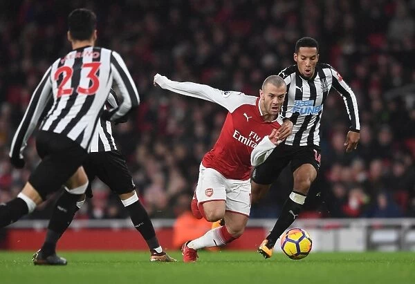 Arsenal's Jack Wilshere Clashes with Newcastle's Isaac Hayden in Premier League Showdown