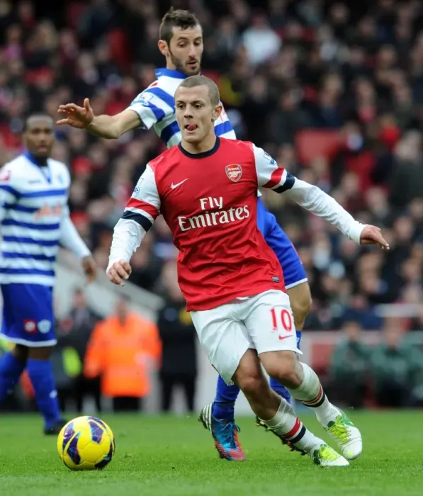 Framed Print : Arsenal's Jack Wilshere Clashes with Queens Park Rangers Esteban Granero (2012-13)