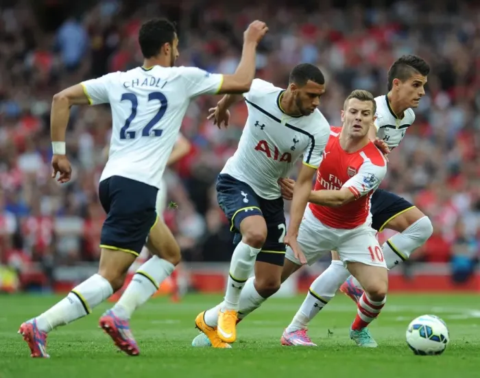 Framed Print : Arsenal's Jack Wilshere Clashes with Tottenham's Lamela, Capoue, and Chadli Framed Print : Arsenal's Jack Wilshere Clashes with Tottenham's Lamela, Capoue, and Chadli