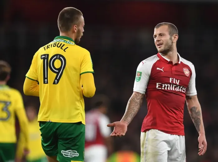 Framed Print : Arsenal's Jack Wilshere Confronts Norwich's Tom Trybull in Carabao Cup Clash Framed Print : Arsenal's Jack Wilshere Confronts Norwich's Tom Trybull in Carabao Cup Clash