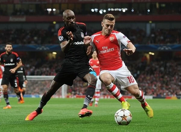 Arsenal's Jack Wilshere Faces Off Against Atiba Hutchinson of Besiktas in UEFA Champions League Qualifier