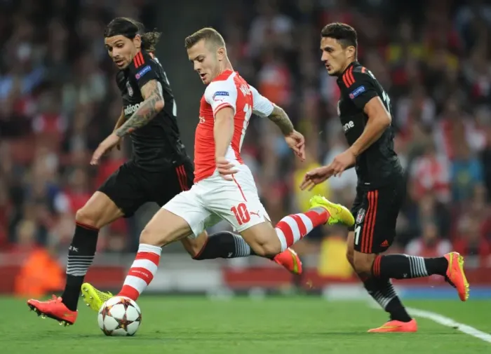 Framed Print : Arsenal's Jack Wilshere Faces Off Against Besiktas Duo in Champions League Clash