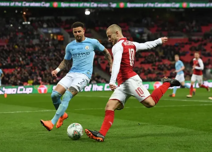 Framed Print : Arsenal's Jack Wilshere Faces Off Against Manchester City's Kyle Walker in Carabao Cup Final Showdown Framed Print : Arsenal's Jack Wilshere Faces Off Against Manchester City's Kyle Walker in Carabao Cup Final Showdown