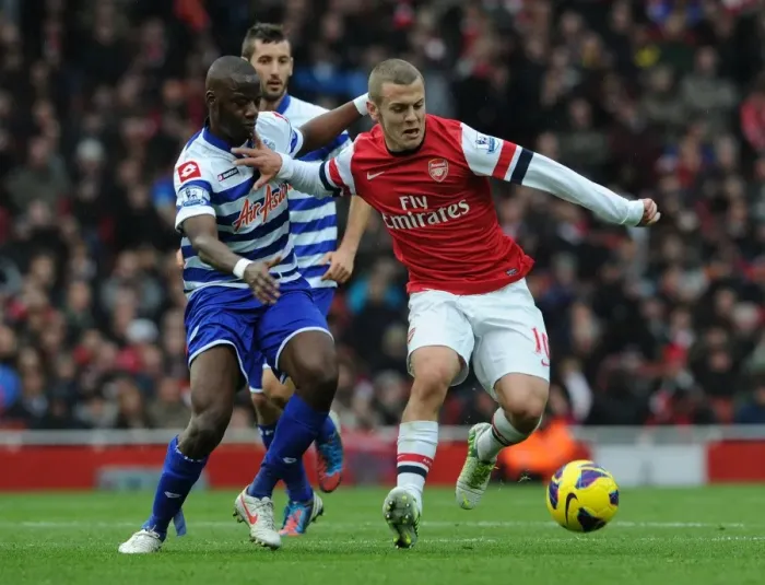Framed Print : Arsenal's Jack Wilshere Faces Off Against QPR's Samba Diakite (2012-13) Framed Print : Arsenal's Jack Wilshere Faces Off Against QPR's Samba Diakite (2012-13)
