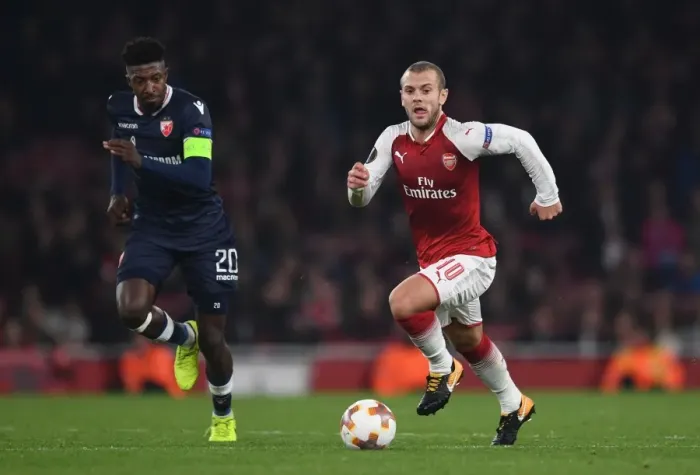 Framed Print : Arsenal's Jack Wilshere Faces Off Against Richmond Donald in Europa League Clash