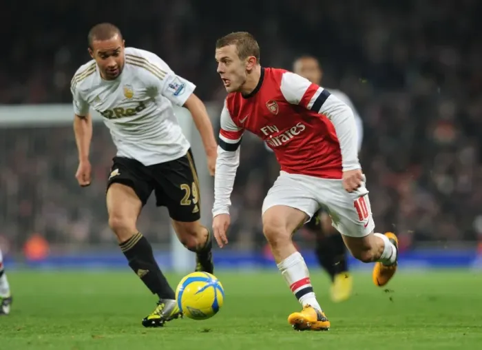 Framed Print : Arsenal's Jack Wilshere Faces Off Against Swansea's Ashley Richards in FA Cup Third Round Replay