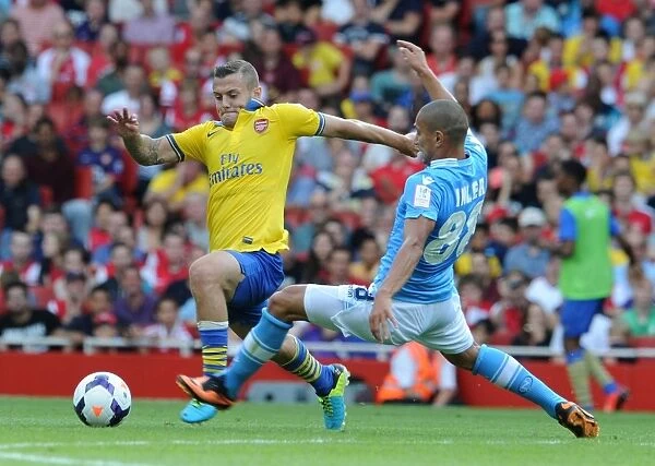 Arsenal's Jack Wilshere Fends Off Napoli's Gokhan Inler in 2013-14 Emirates Cup Clash